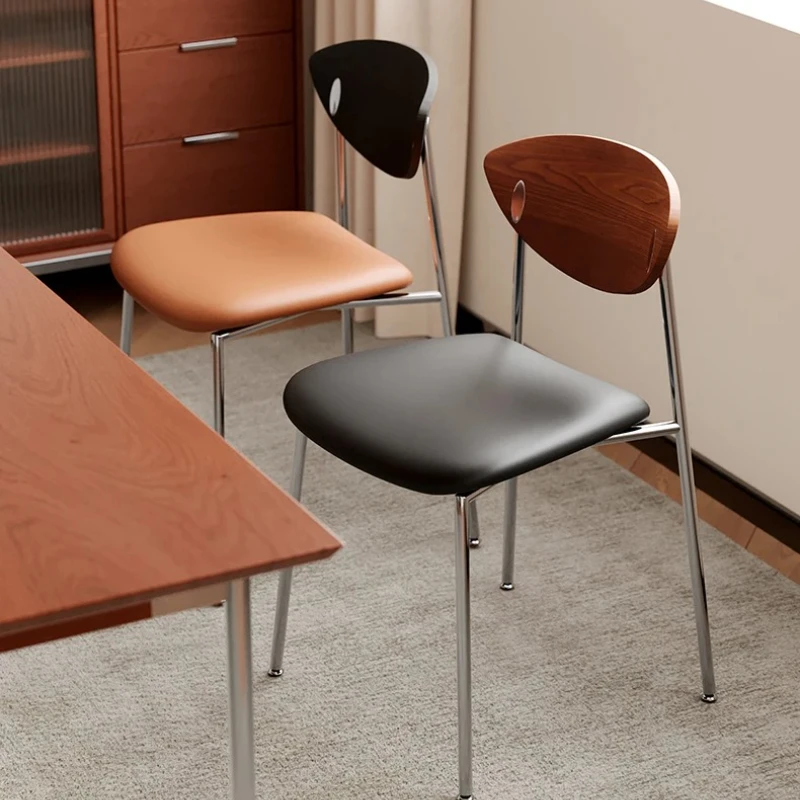 كرسي طعام صناعي عتيق من الفولاذ المقاوم للصدأ مع مسند ظهر خشبي مصمم للمقهى ومقعد مطعم بسيط