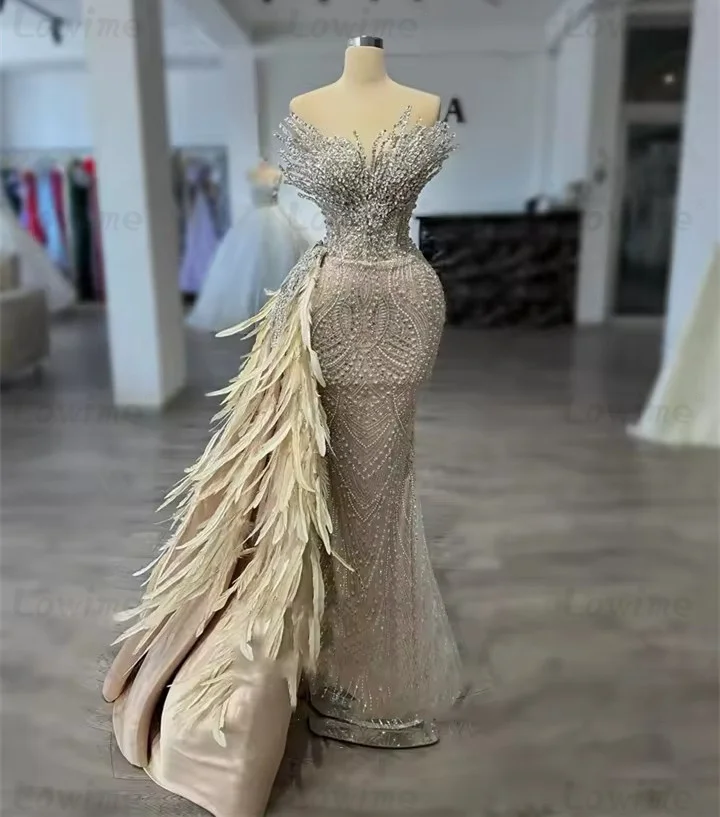 

Feathers Crystal Beaded Evening Dresses With Side Train Arabic Dubai Celebrity Dress 2026 Customized Mermaid Long Prom Gowns