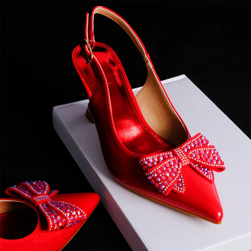 

2024 Fashion Italian Design Luxury Pointed Toe Bright Diamond BowTie Ankle Strap Summer Party Women's Stiletto High Heels Sandal