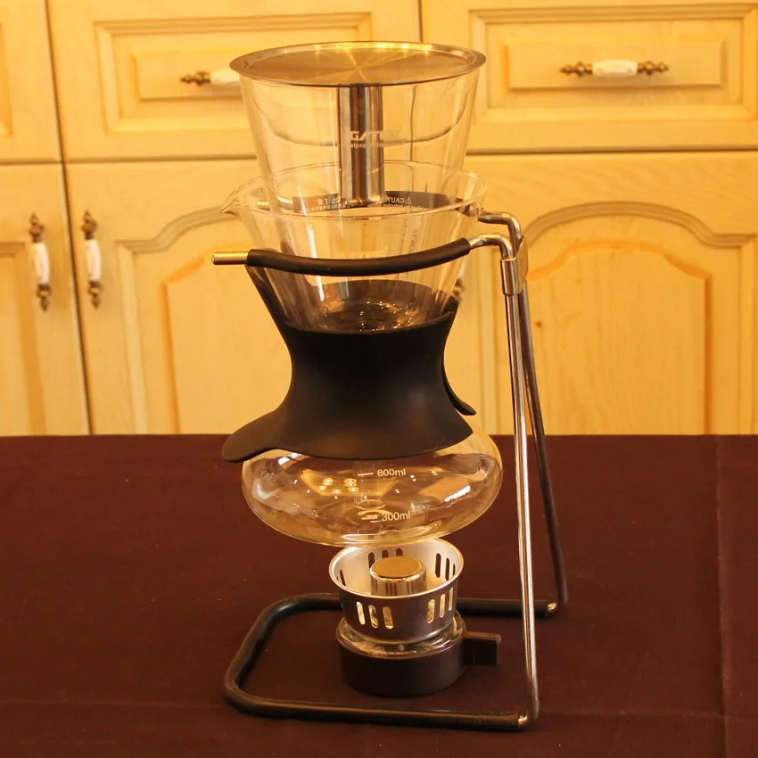 Siphon glass coffee pot Siphon coffee machine can be heated by induction cooker for many people to use at home.