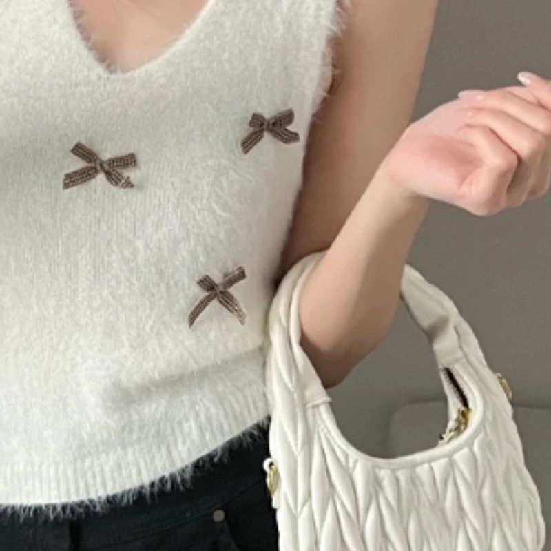 

Осенний корейский темпераментный плюшевый жилет без рукавов с v-образным вырезом и бантом для женщин