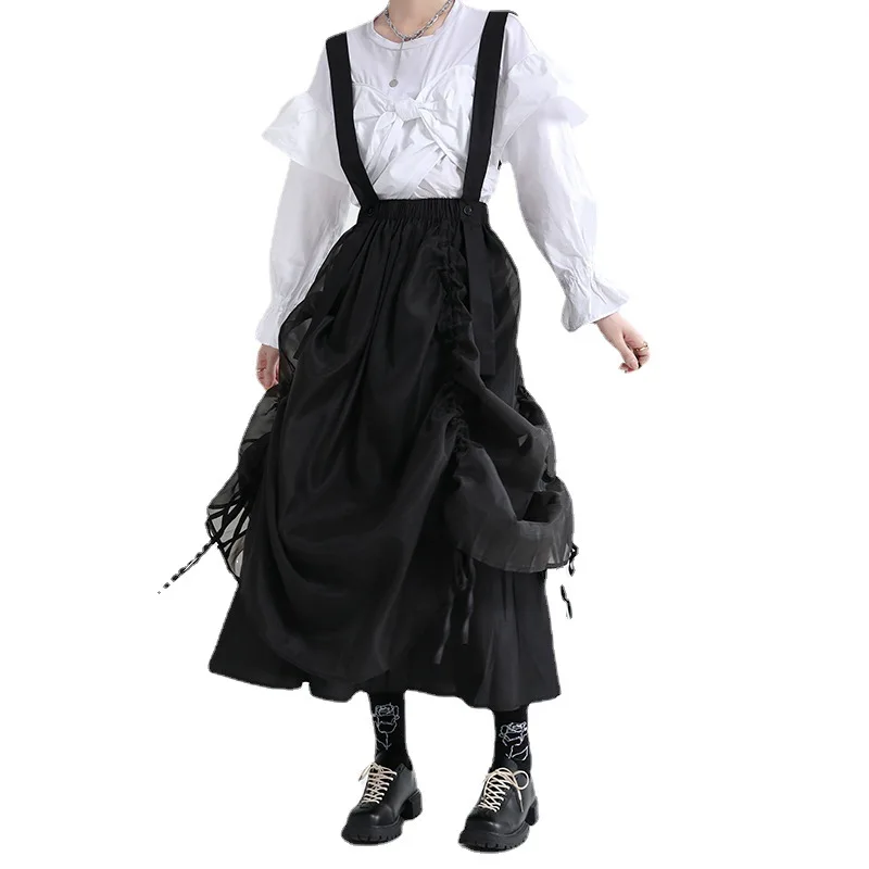 Design sense black suspender skirt 2024 spring clothes high waist slimming mid-length drawstring half skirt female