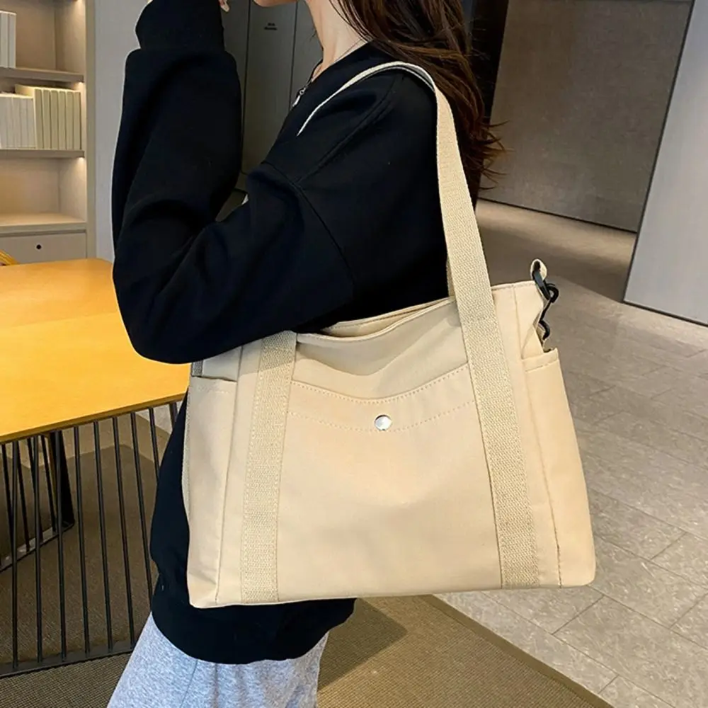 

Casual Solid Color Multi Pocket Tote Bag Large Capacity Lightweight Nylon Crossbody Bag Simple Canvas Tote Bag Student
