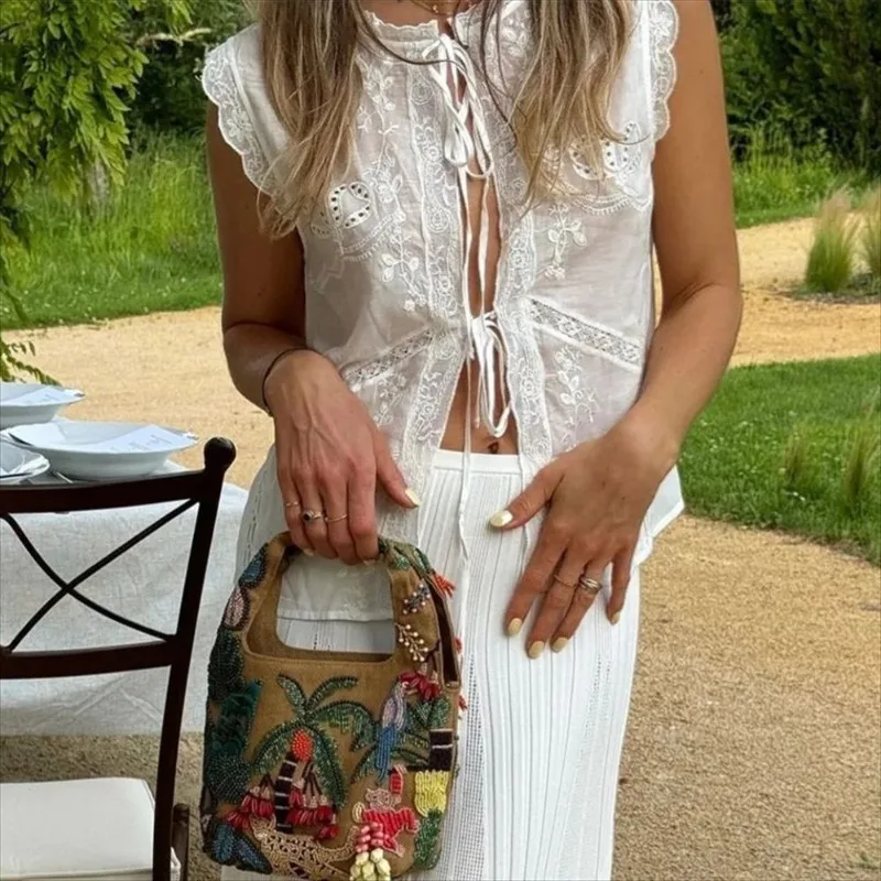2026 New Women French Vacation Eyelet Lace Sleeveless Blouse Bow Tie Front Hollow Embroidery Casual Beach Daily Cropped Top