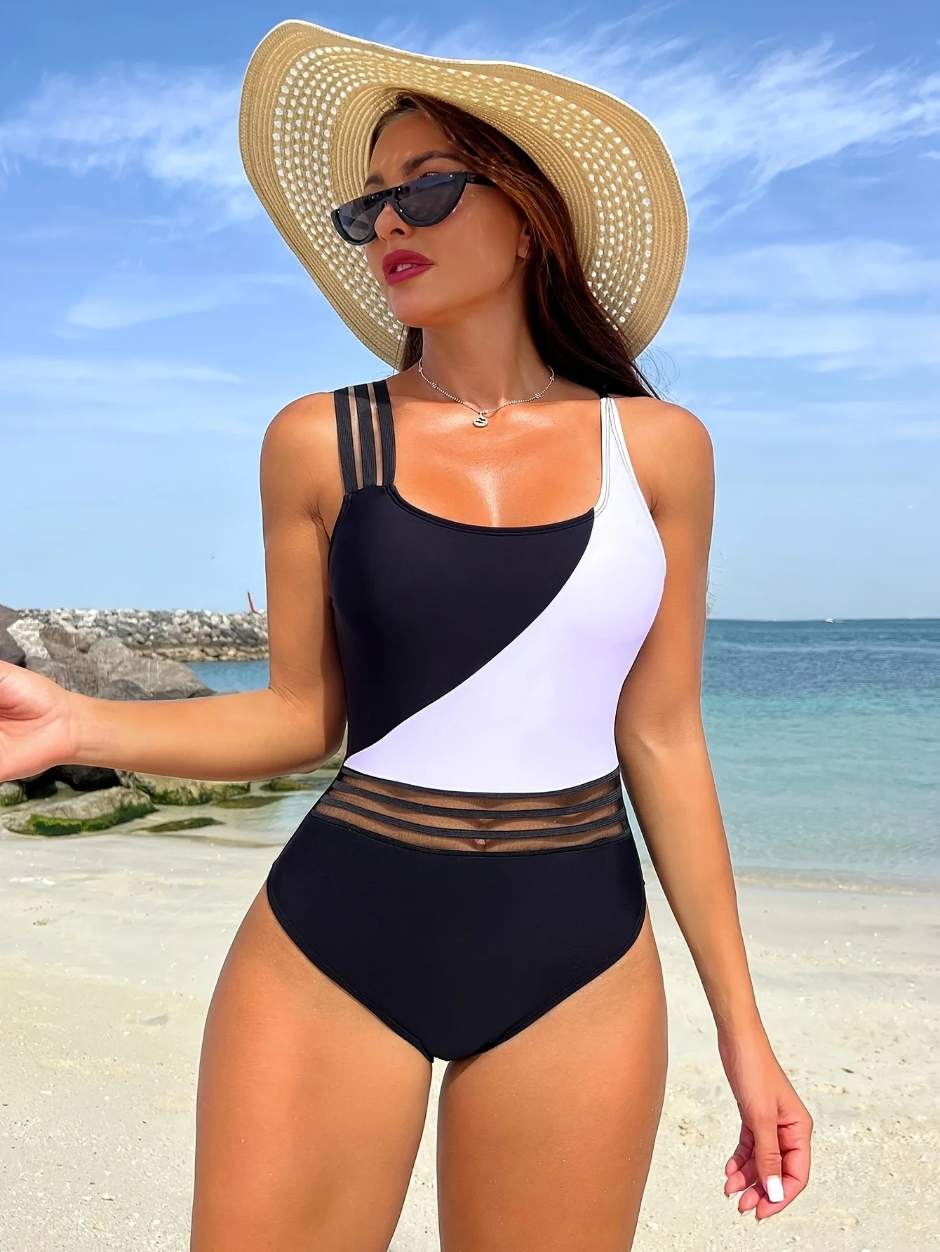 Women's one-piece swimsuit with high elasticity mesh fabric and detachable bra pads, black and white contrast bikini.