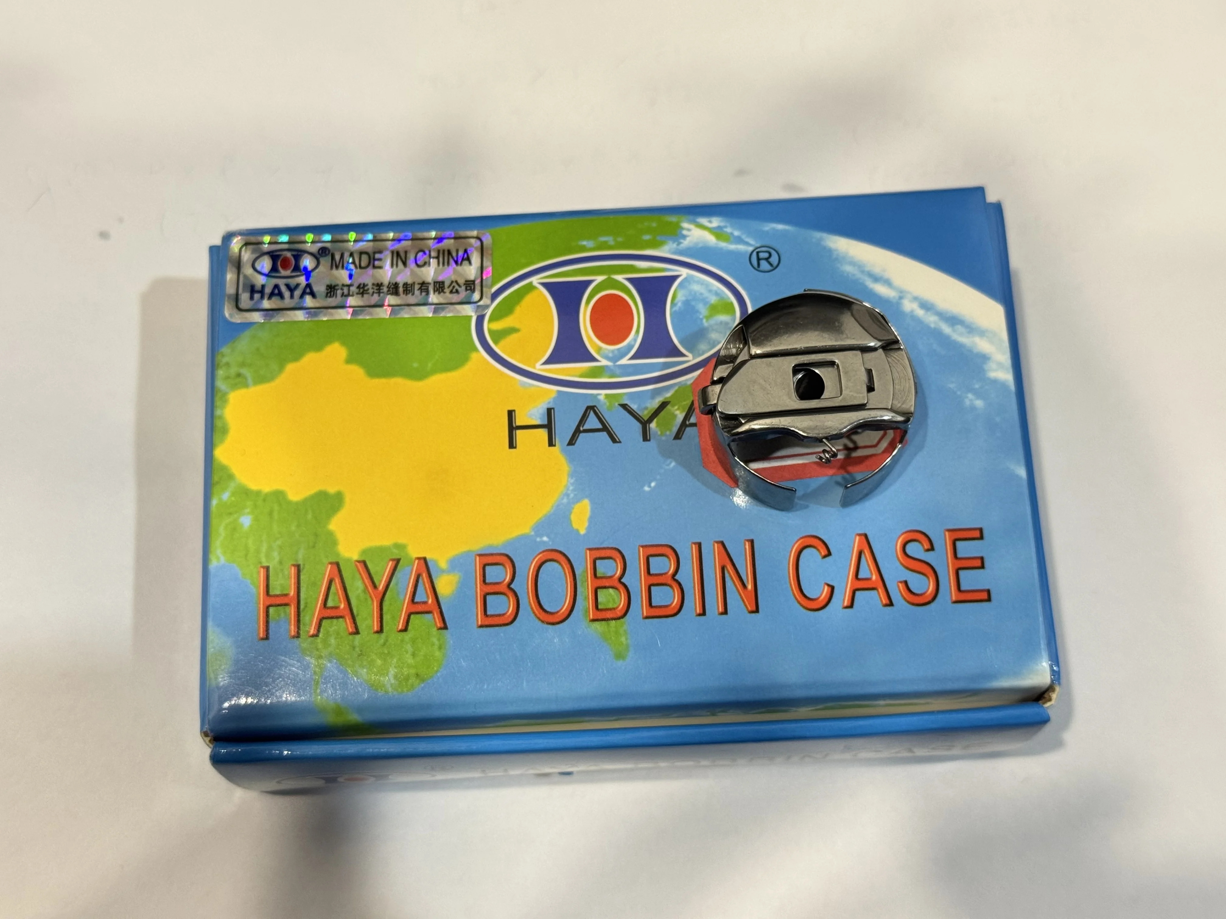 

BC-DBM(Z2)-NBL(20 pcs) HAYA China Good Quality (Jumbo) L Size Bobbin Case Embroidery Machine Parts Suitable for Tajima Barudan