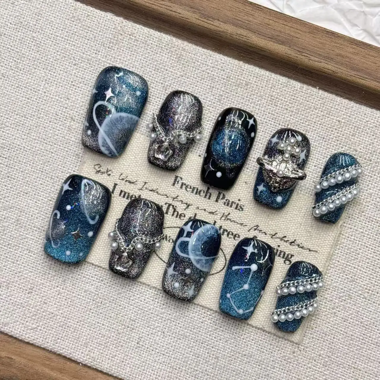 

Mysterious Cosmic Press On Nails Deep Blue Black 3D Planet Rhinestones Easy To Apply Deep Blue Black Planet Starry Design