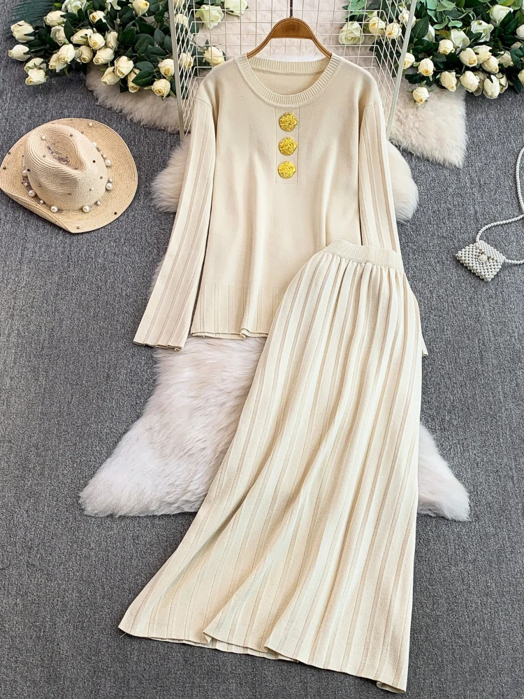 

Women's Spring New Unique Light Luxury Metal Buckle Knitted Pullover Loose Pleated Middle Long Skirt Solid Color Two Piece Set