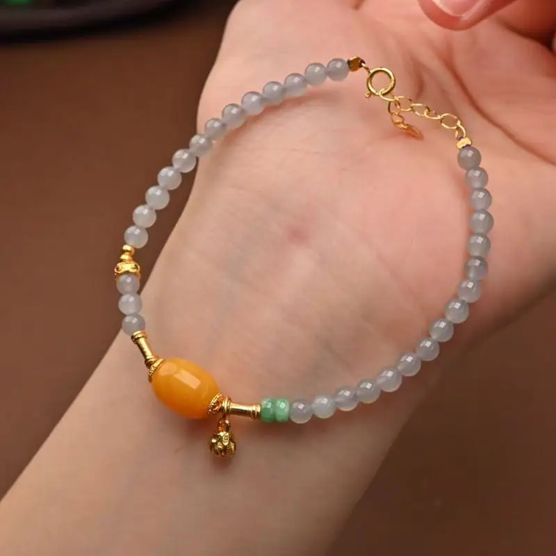 Natural Hetian Jade, Smoky Purple , And Old-Fashioned Waxed Jujube Beads Are Combined In This Bracelet