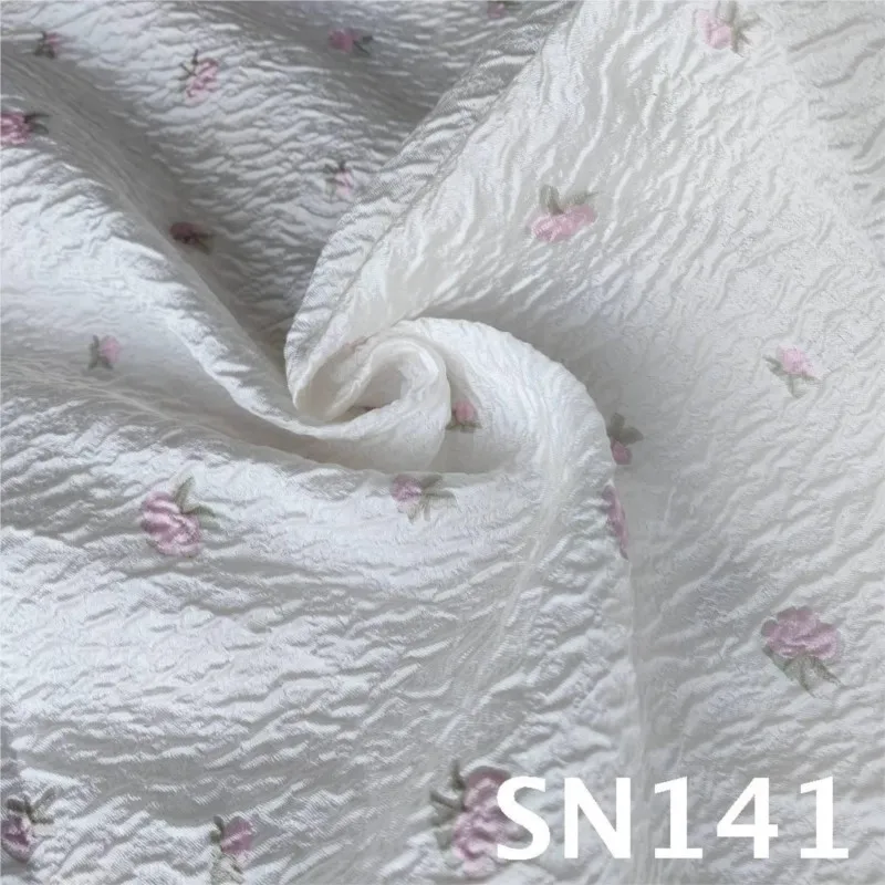 Semi-permeable foamed organza cut-cut jacquard fabric with embossed and small floral print dress made of