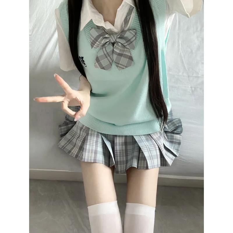 Original by Kongli Shu WanjkUniform vest, waistcoat, shirt, Japanese college stylejkPlaid skirt and pleated skirt layered outfit