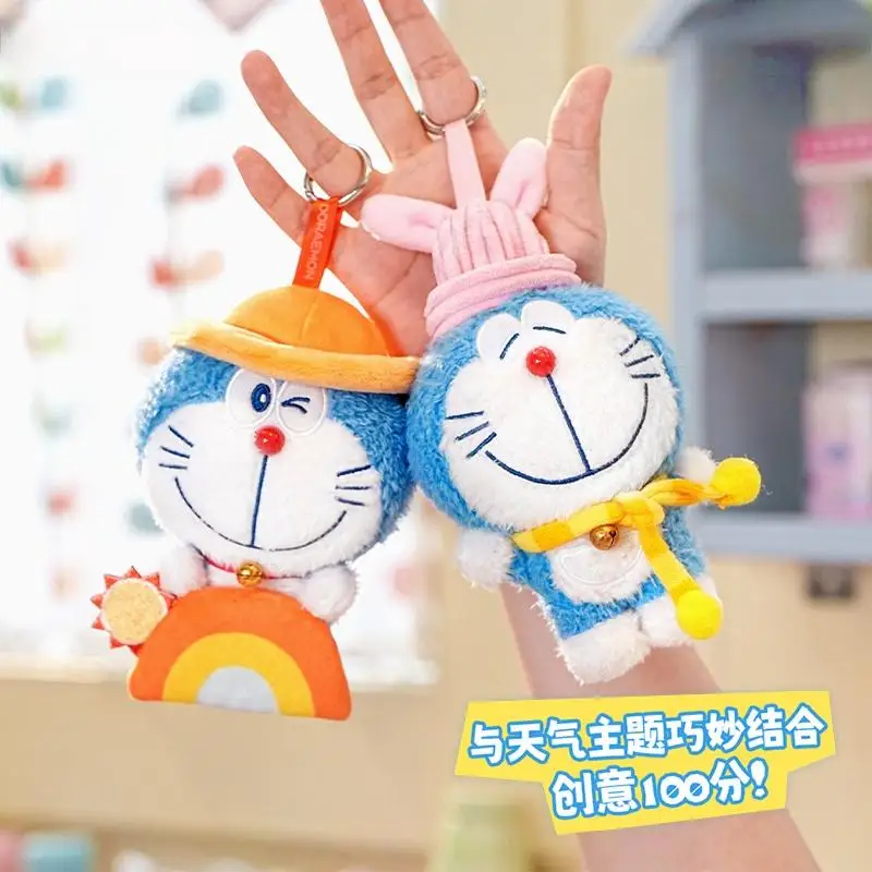 Pluche Blind Box Officiële Doraemon - Mini-sleutelhanger met willekeurige karakters Leuke Anime Plushie-rugzak en autodecor Nostalgisch cadeau