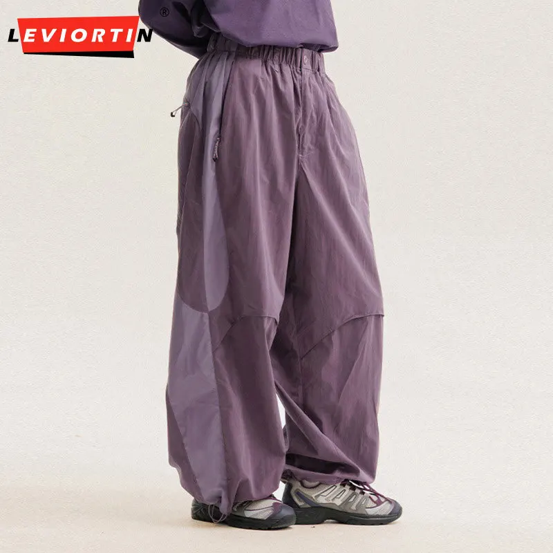 Men's American high street mountain outdoor quick drying anti splash sports and leisure side color blocked loose wide leg pants