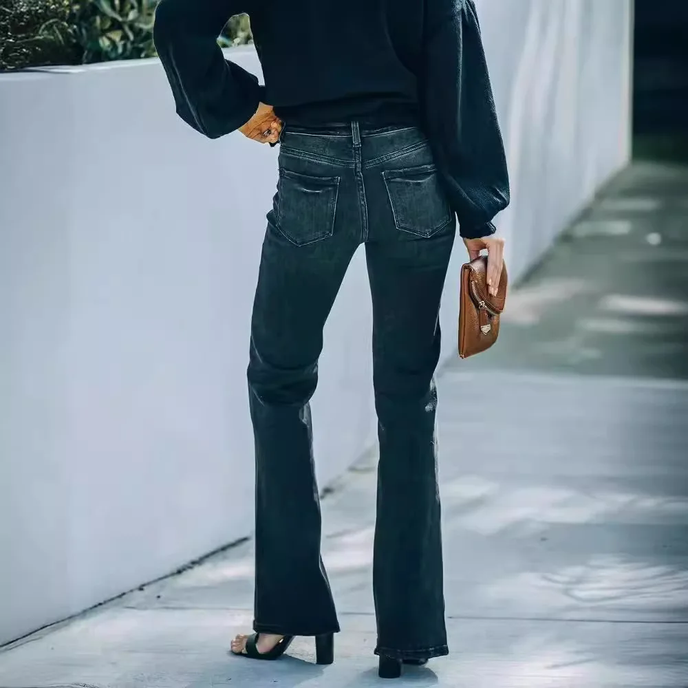 กางเกงยีนส์สีดำทรงสลิมฟิตเอวสูงผ้ายืดสำหรับผู้หญิง สไตล์ตะวันตก รุ่นใหม่ล่าสุดสำหรับฤดูใบไม้ผลิ ช่วยให้ดูผอมเพรียว ใส่ได้หลากหลาย ทรงยาวคลุมเท้า