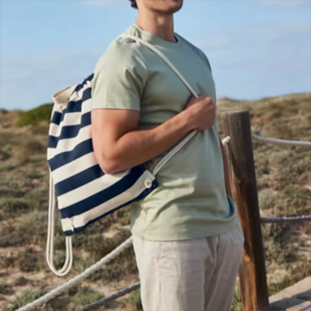 

Custom Fashion Striped Cotton Canvas Drawstring Backpack Durable Foldable Gym Bag with Logo for Men Women Travel Beach Daily Use