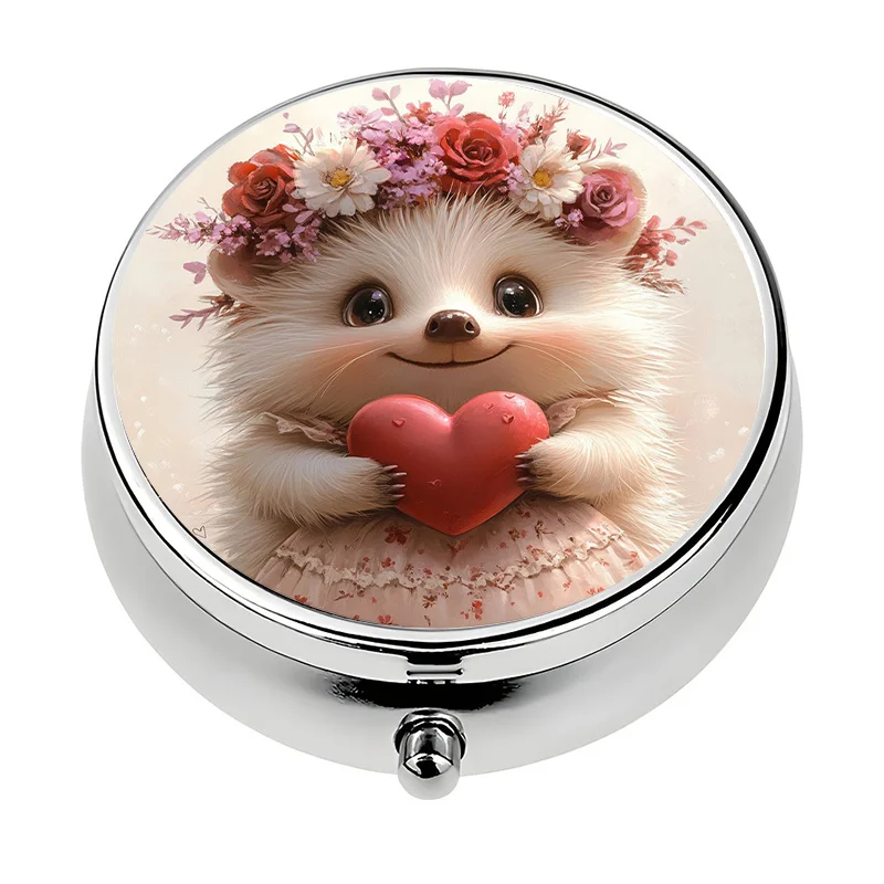 A compact pill box, divided into three compartments, designed with cute hedgehog and crown patterns, is perfect for organizing pills and makes a unique travel gift.