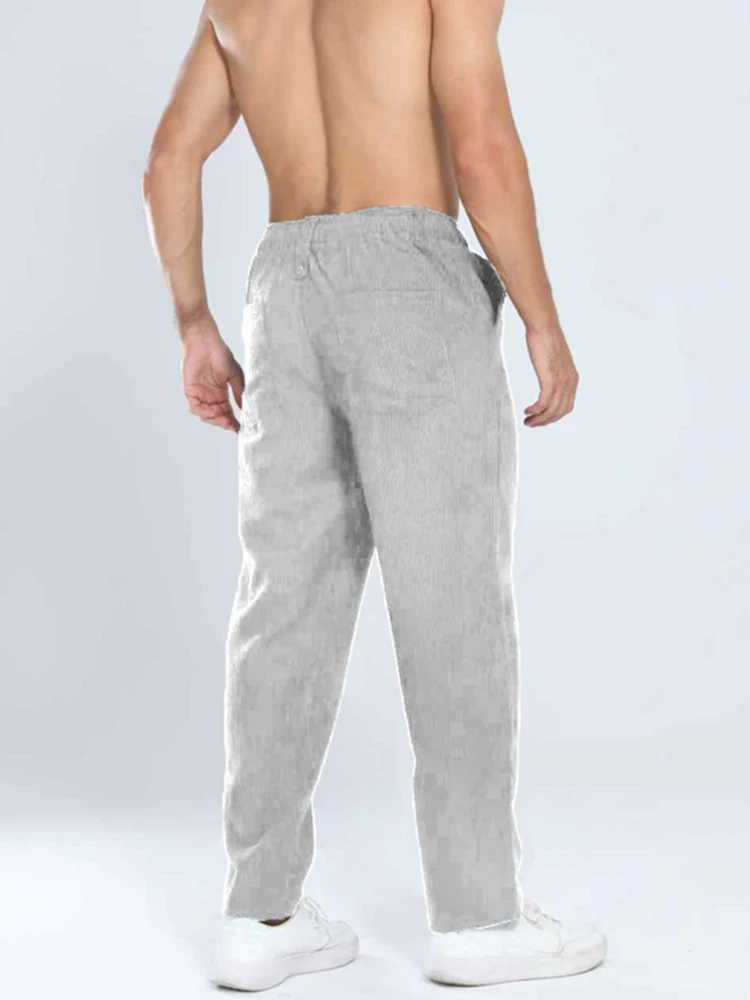 Pantaloni da uomo fitness sportivi primavera autunno Pantaloni di velluto a coste testurizzati a righe vintage Streetwear Pantaloni casual da uomo in tinta unita