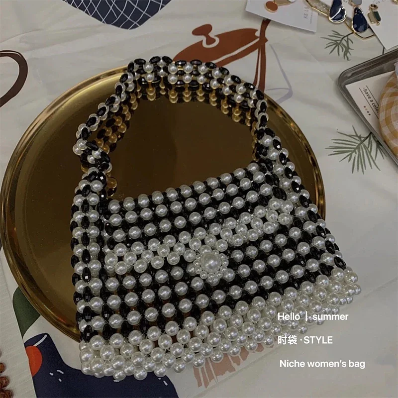 

Fashion INS Handmade Beaded Pearl Knitted Handheld Shoulder Bag New High Quality Black Spliced Women's Bag 2024 Customization