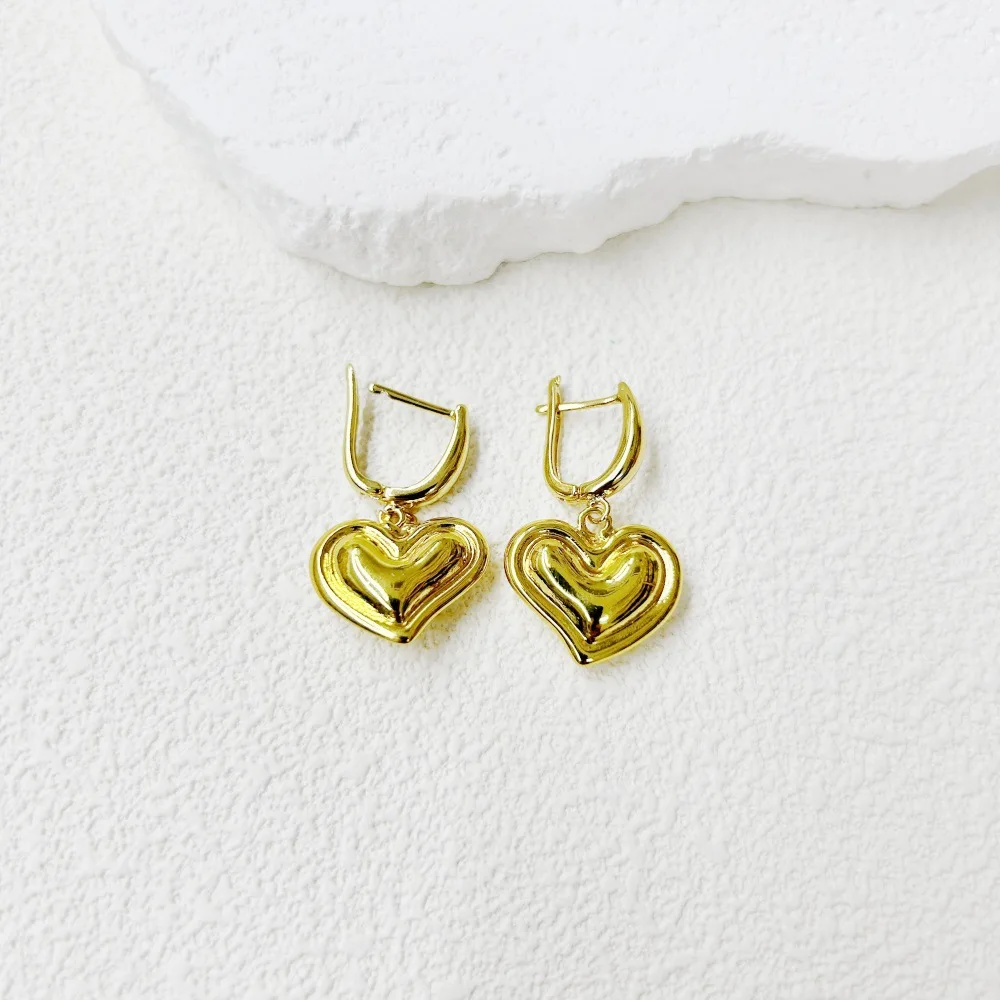 Versatile copper three-dimensional smooth surface hollow love U-shaped ear buckle earrings, oval windmill women's jewelry