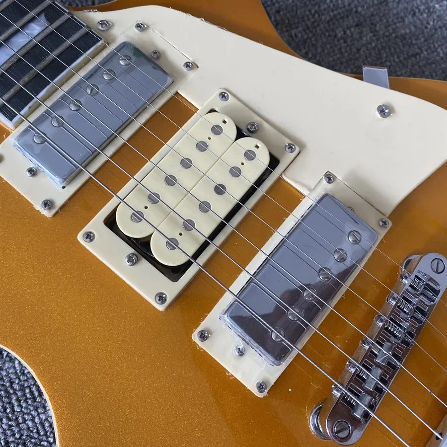 High quality electric guitar, gold top and yellow back finish, rosewood fingerboard, chrome hardware, 3 pickups