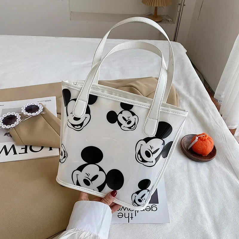 Disney Mickey shoulder bag spring and summer shoulder bag Minnie handbag female transparent mobile phone cosmetic bag cute