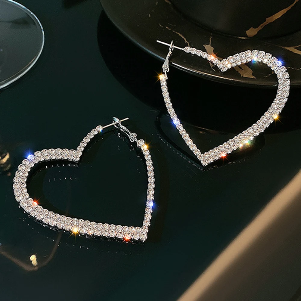 

Изысканные блестящие серьги-кольца в форме сердца, полностью украшенные кристаллами и стразами, для женщин и девушек, для банкетов, юбилеев, украшения на годовщину.