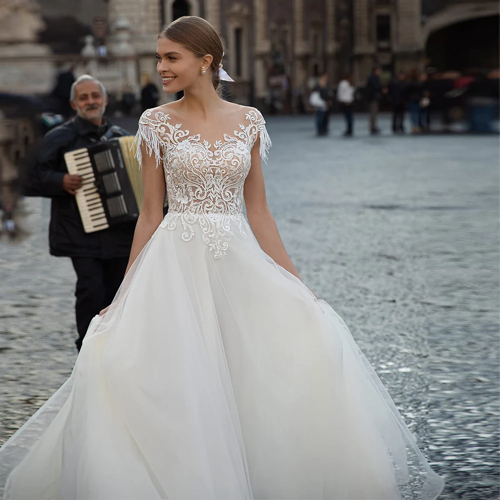 Flavinke-vestido de novia elegante de tul, traje Formal de encaje con cuello redondo, manga casquillo y borlas, con botón en la espalda, tren de barrido