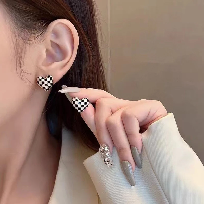 In 2026, the new check-pattern unique design metal stud earrings are suitable for fashionable women's wear. The simple heart-sha