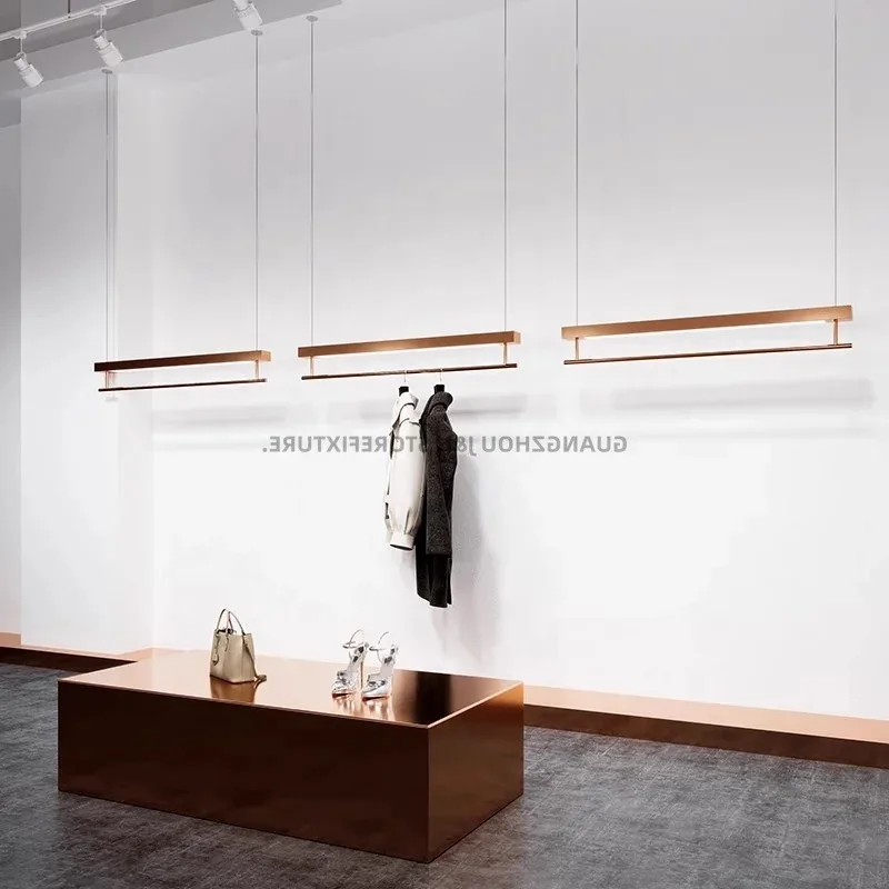 custom.New Rose Gold Clothes Rack Popular Clothing Store Furniture Wall Ceiling Metal Display Stand with LED Light