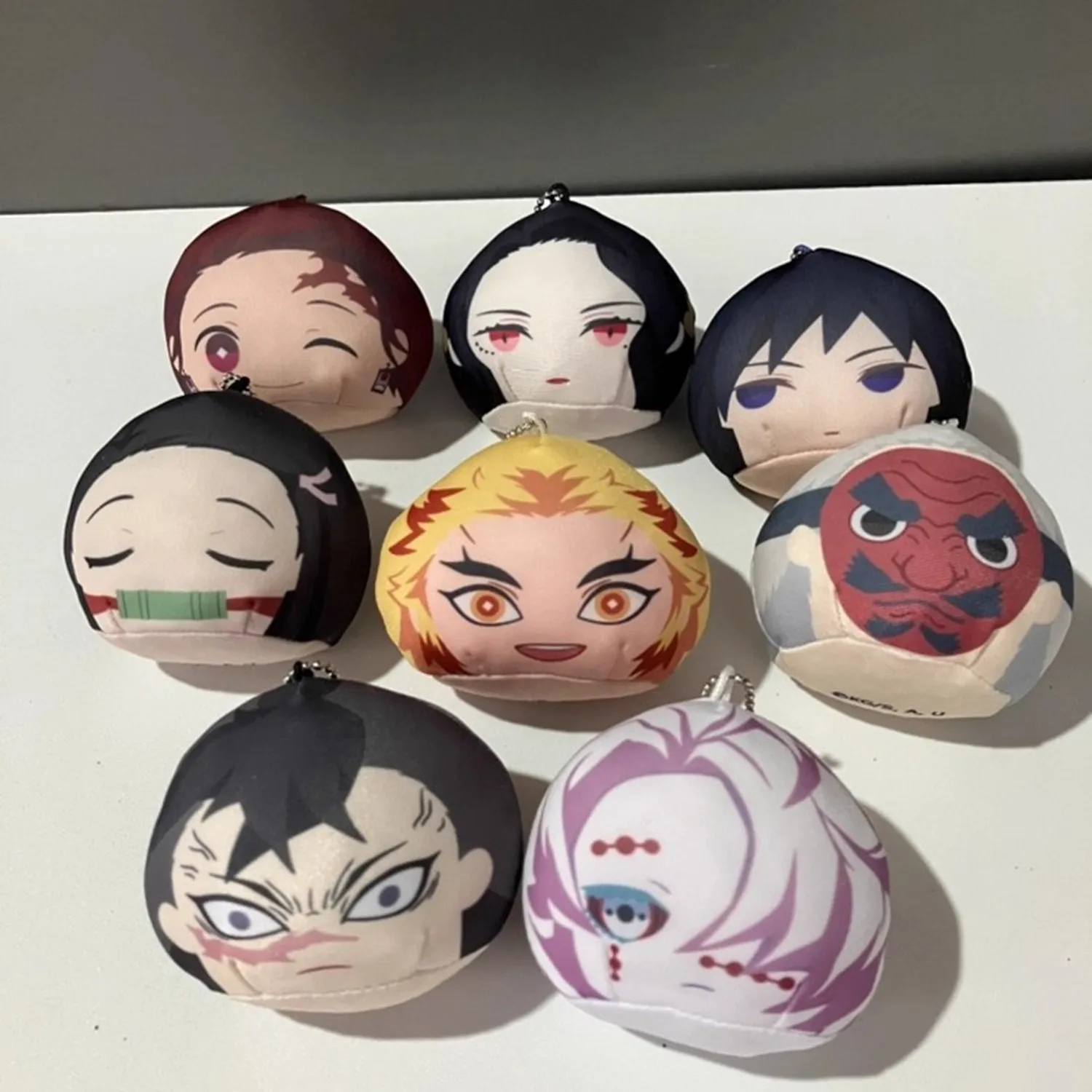 

New Cute Anime Demon Nezuko Tanjiro Inosuke Zenitsu Face Plush Keychains Kids Stuffed Toys For Children 7CM