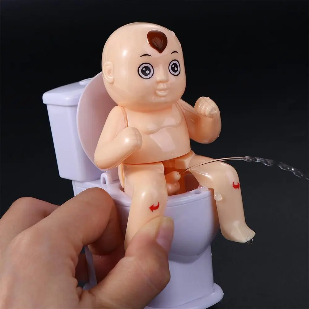 Gag Spielzeug Cartoon Muster Humanoiden Puppe Lustige Spray Streich Toilette Pee Junge Wasser Spray Spielzeug Mini Sprinkler Toilette Spritzen Witz Spielzeug