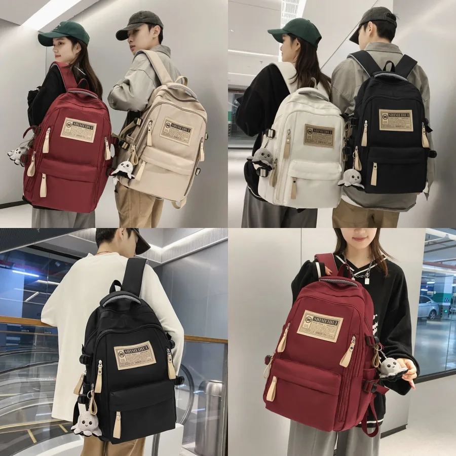 

【New style】New large-capacity backpack for male and female college students. Same schoolbag for junior high school students. Tr