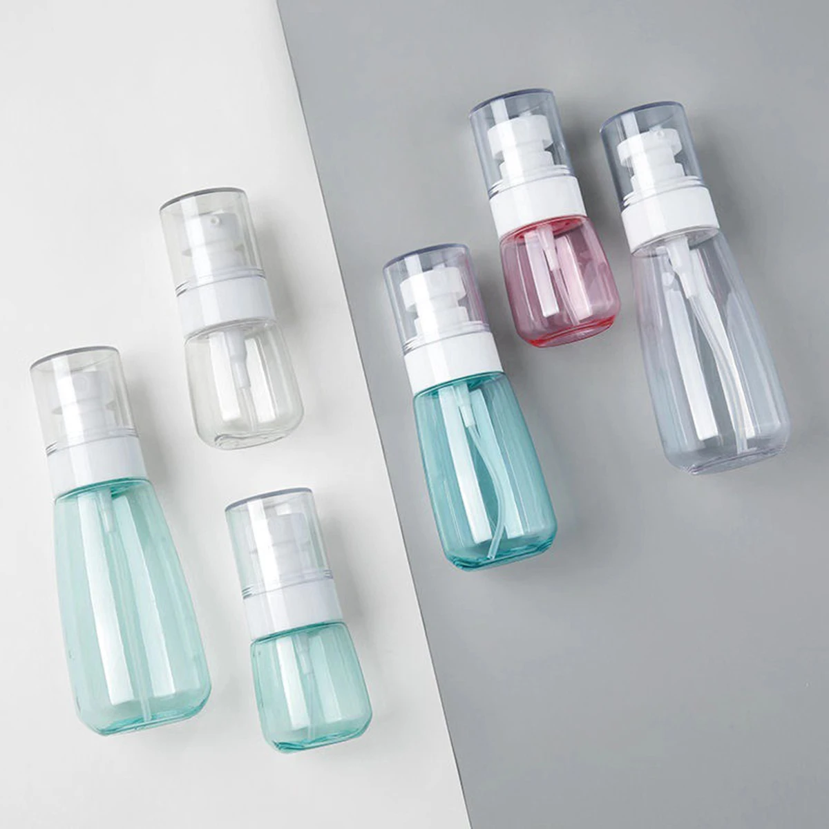 Refillable 60ml 100ml Clear PET Plastic Portable Spray Bottle Empty Perfume Container