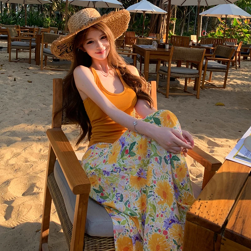 

Dopamine Boosting Yellow Floral Halterneck Skirt Set Beach Ready Bright Summer Outfit Women's Fashion Sleeveless round Neck