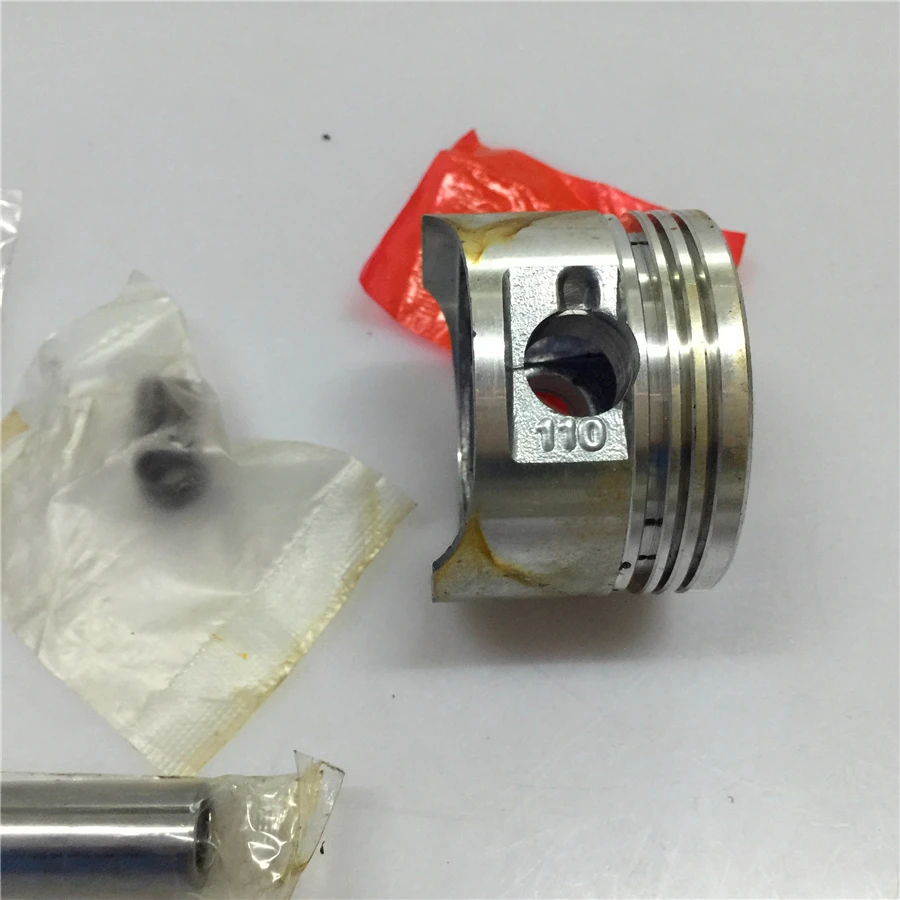 

1set For GN125 GS125 HJ125-A piston ring piston older drilling leopard convex top piston