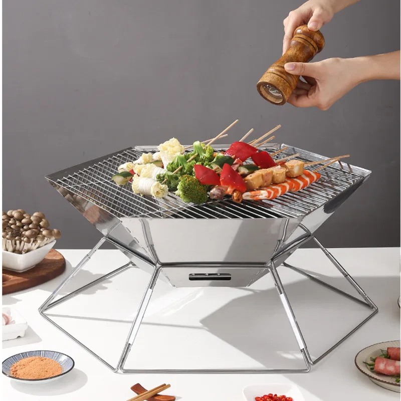 

Stainless Steel Foldable Outdoor Camping Portable Charcoal Grill Barbecue Grill Thickened and Ventilated with Carbon Meat Grills