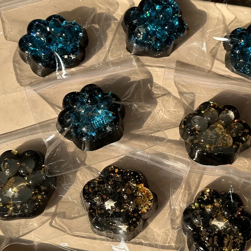 Juguete relajante blando con forma de pata de gato de galaxia: diseño de brillo azul translúcido y negro de crecimiento lento, divertido recuerdo de fiesta o regalo de cumpleaños para Gi