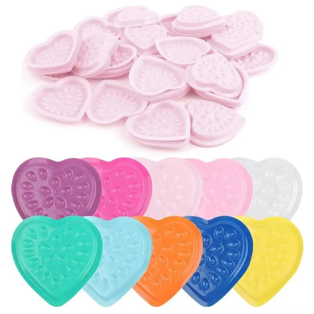 100PCS High Quality Adhesive Eyelash Glue Holder PVC Heart Shaped Lash Adhesive Stand Pads Flower Plastic Gasket Palett