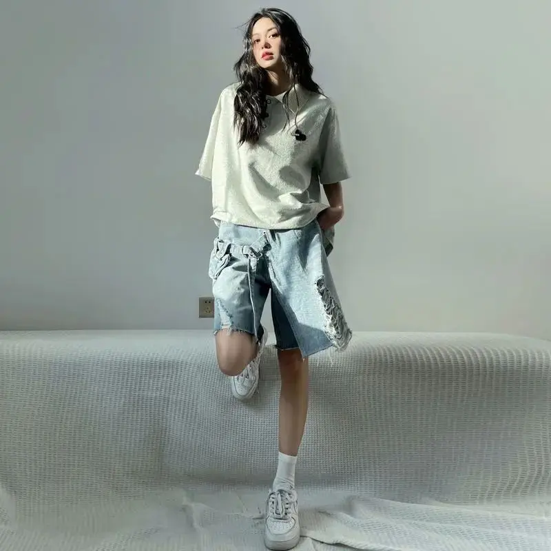 Pantaloncini di jeans a cinque punti per ragazza calda e sottile dal design nazionale alla moda