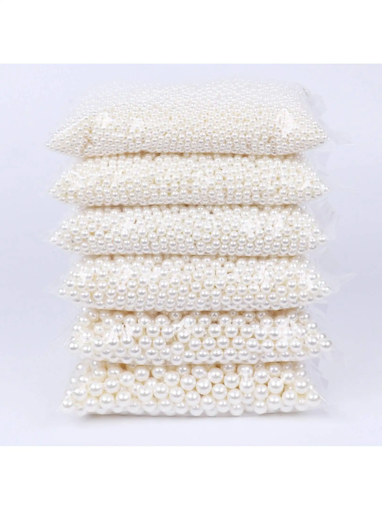 A pack of 25g 4-16mm milky white ABS bright double hole pearl imitation DIY material