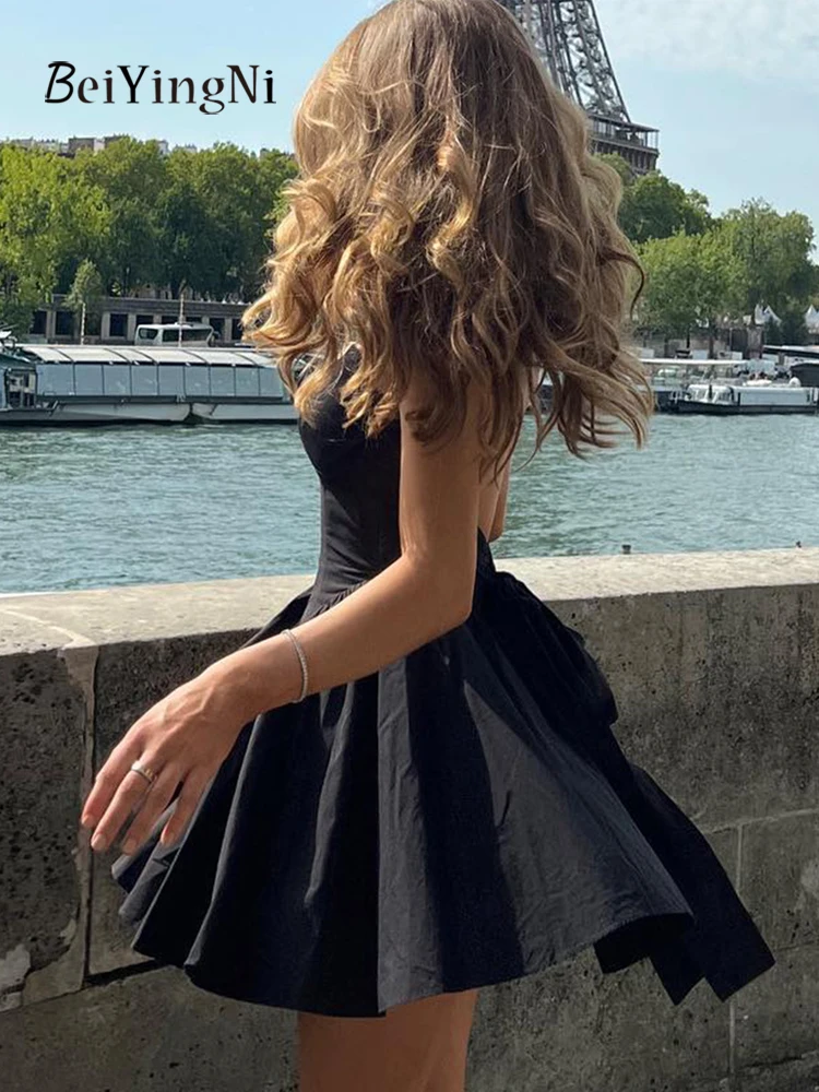 Beiyingni-vestido francés con lazo y espalda descubierta para mujer, Mini vestidos cortos acampanados informales de Color sólido para citas y vacaciones, novedades de verano