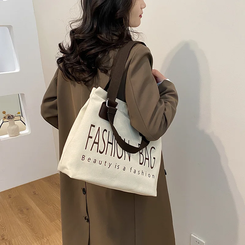 

Korean Canvas Commuting Bag with Letter Printing Large Capacity Single Shoulder Tote Bag for Women