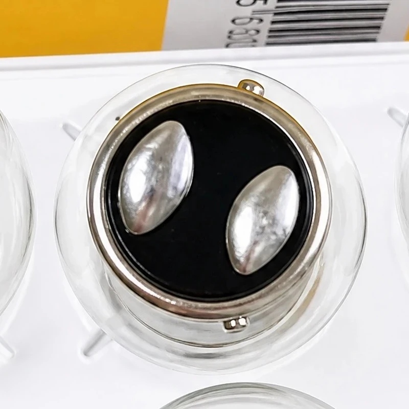 Hella 2 Lamps 12V BAZ15D P21/4W Natural White Glass Double Filament Warm White Car DRL Stop Brake Lights Halogen Bulb