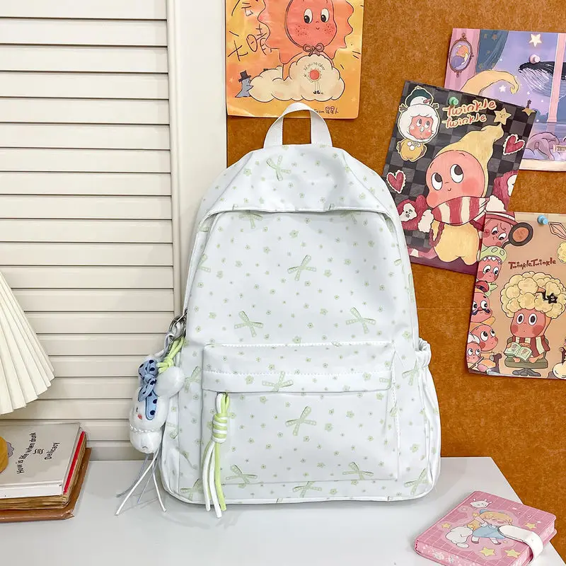 Korean-style floral print school backpack for middle and high school students, stylish and lightweight, for girls2026New style,