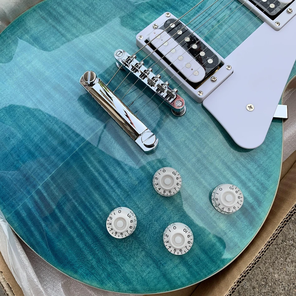 High quality turquoise electric guitar, rosewood fingerboard, made in China