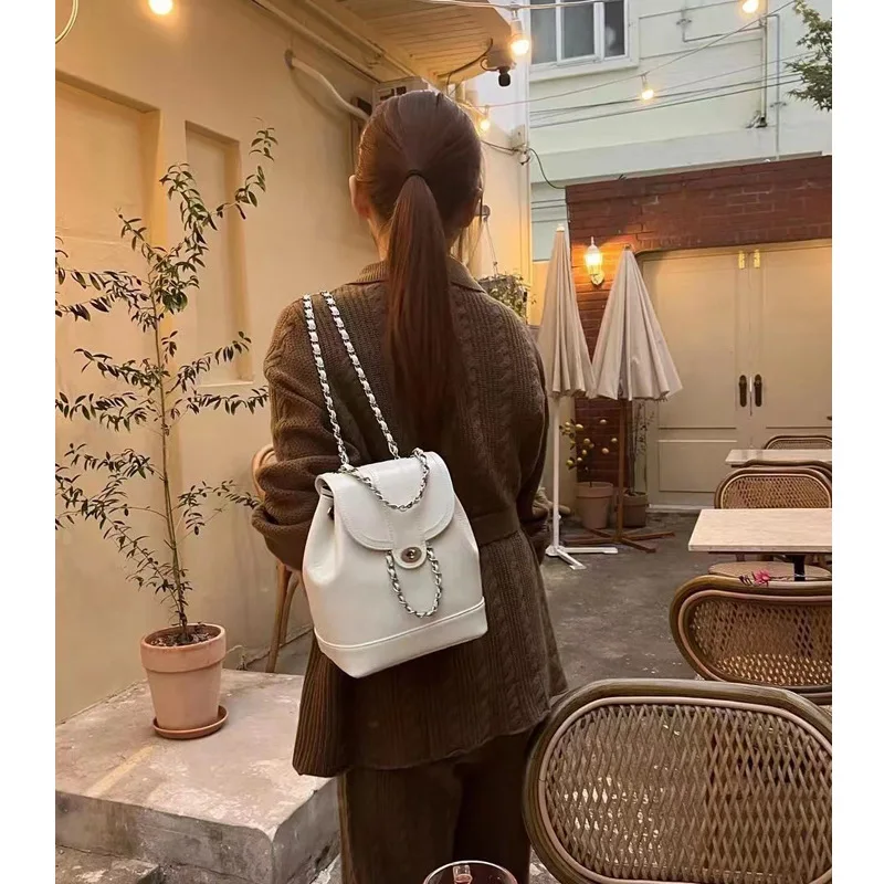 Leather shoulder bag female 2023 new fashion design first layer leather bag chain backpack portable wallet high quality.