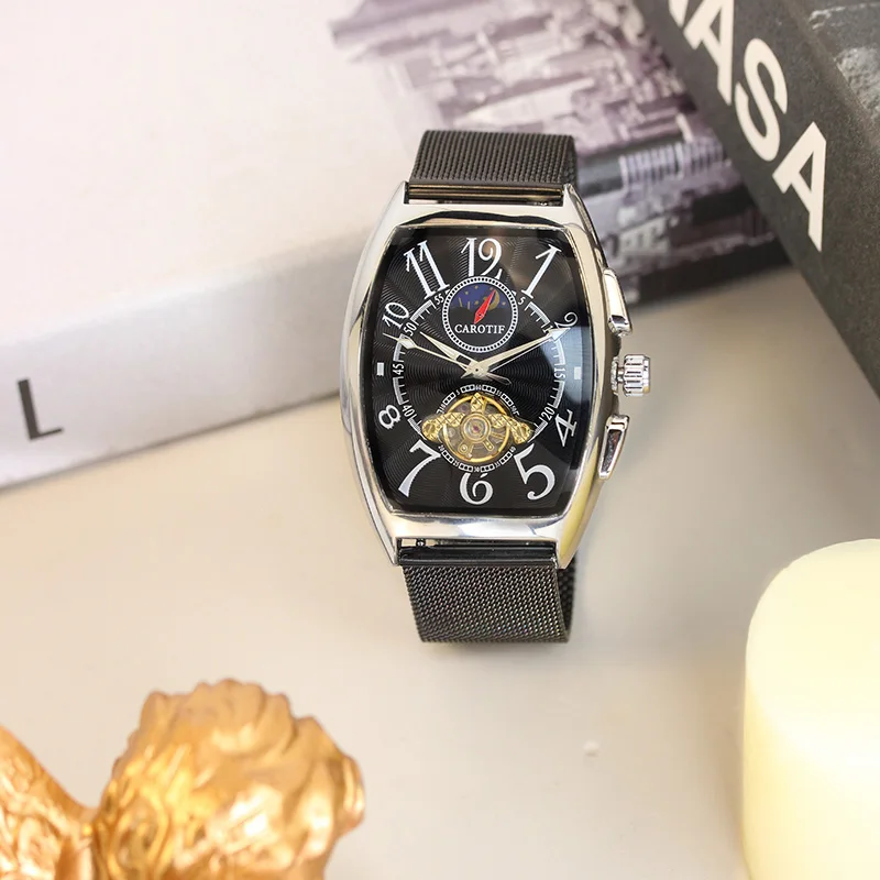

Мужские модные часы с черным сетчатым ремешком и уникальным турбийоном с арабскими цифрами, полностью автоматическим механическим механизмом.