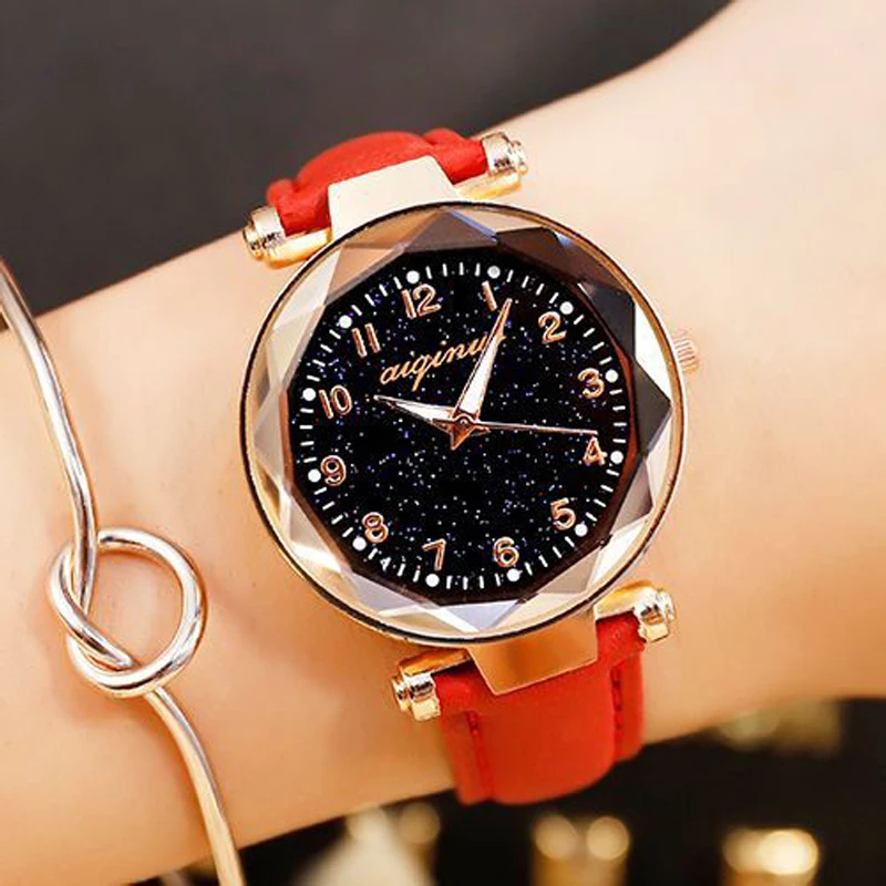 Un regalo lujoso de un reloj de mujer sencillo, estrellado, moderno, moderno y elegante.