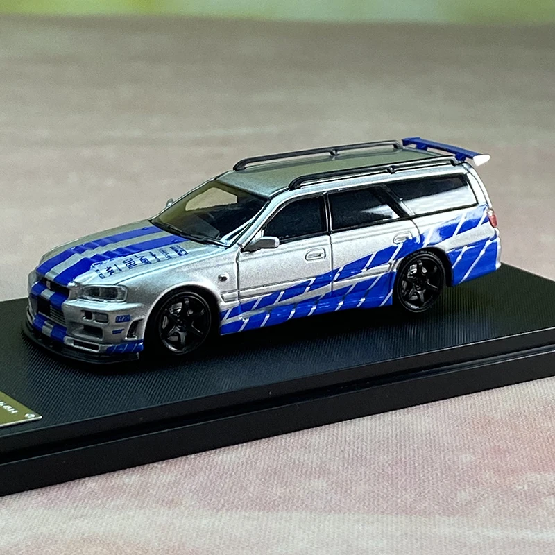 SW دييكاست 1/64 مقياس نيسان ستاجيا R34 GT-R عربة نموذج سيارة سبيكة نيسان ستاجيا R34 GT-R نموذج سيارة هدية مجموعة حلية