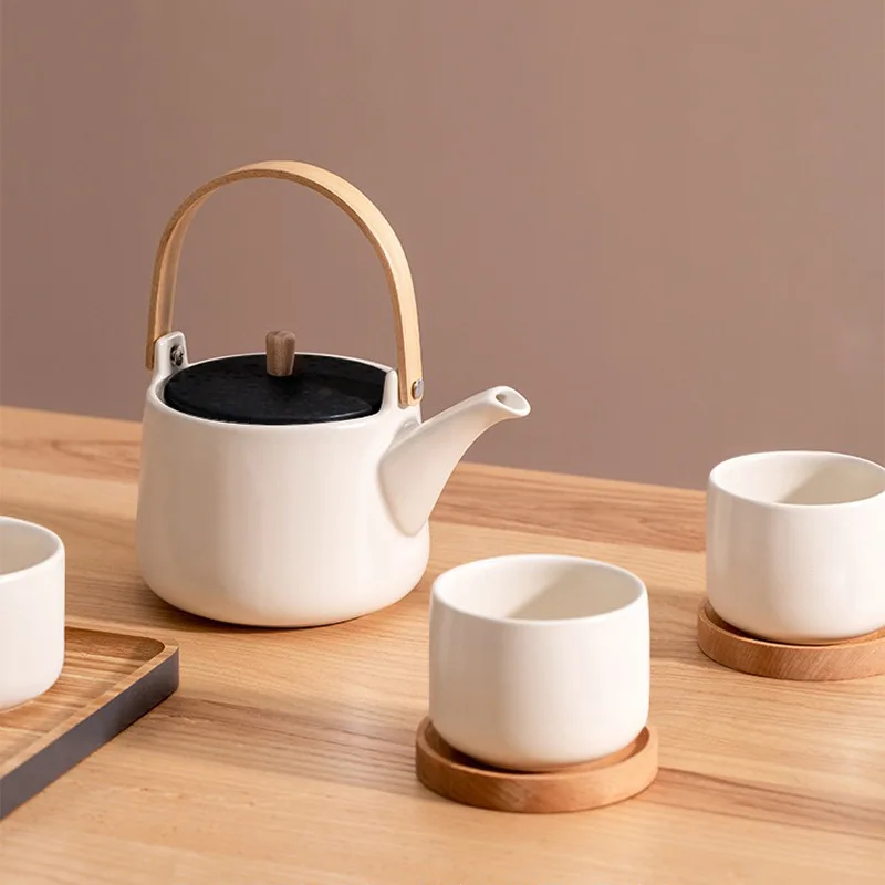 Japanese-style  beam pot ceramic tea set a pot of two cups of household gift box flower teapot set 100ml cup 420ml teapot.